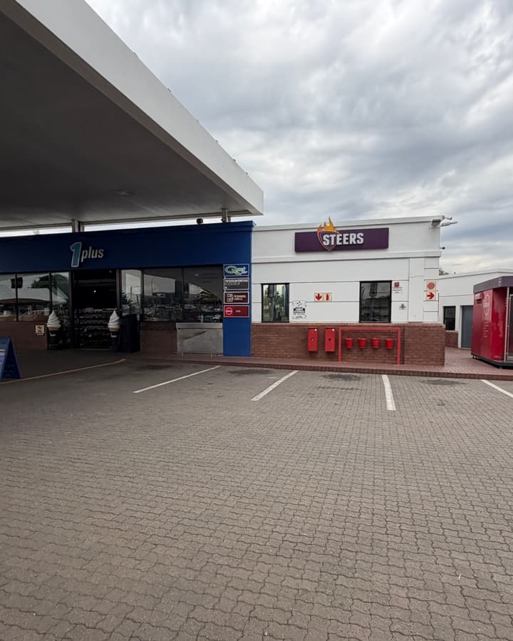 The Curie Park forecourt on a grey morning, as the client photographed it